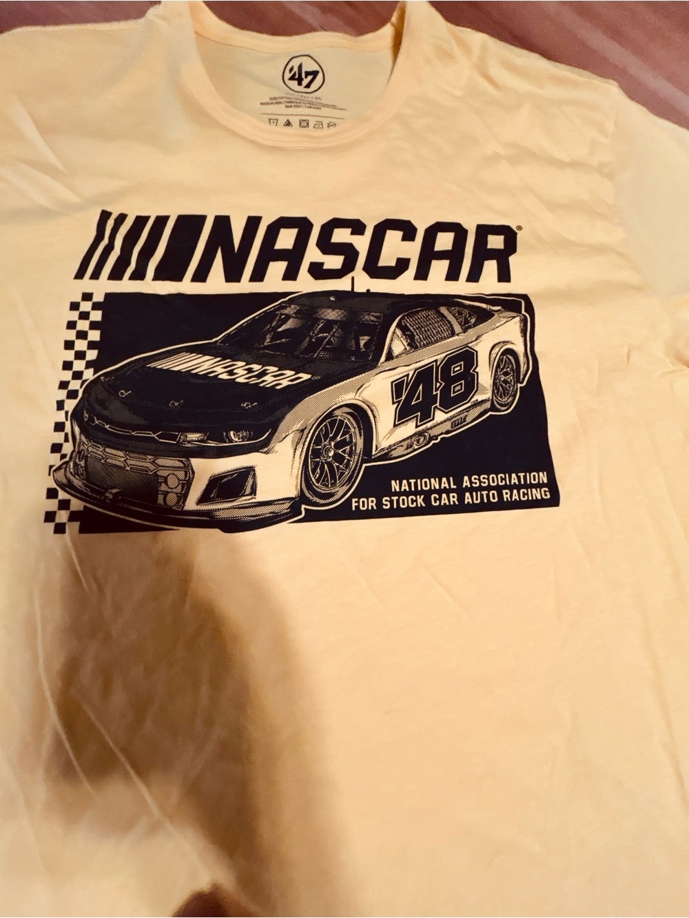 47 NASCAR Graphic Tee in Light Yellow with black Print - Picture 1 of 6